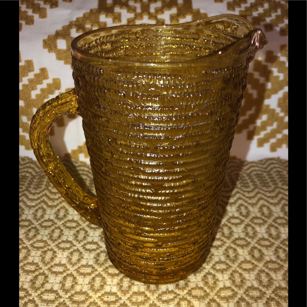 Amber/ gold small glass pitcher